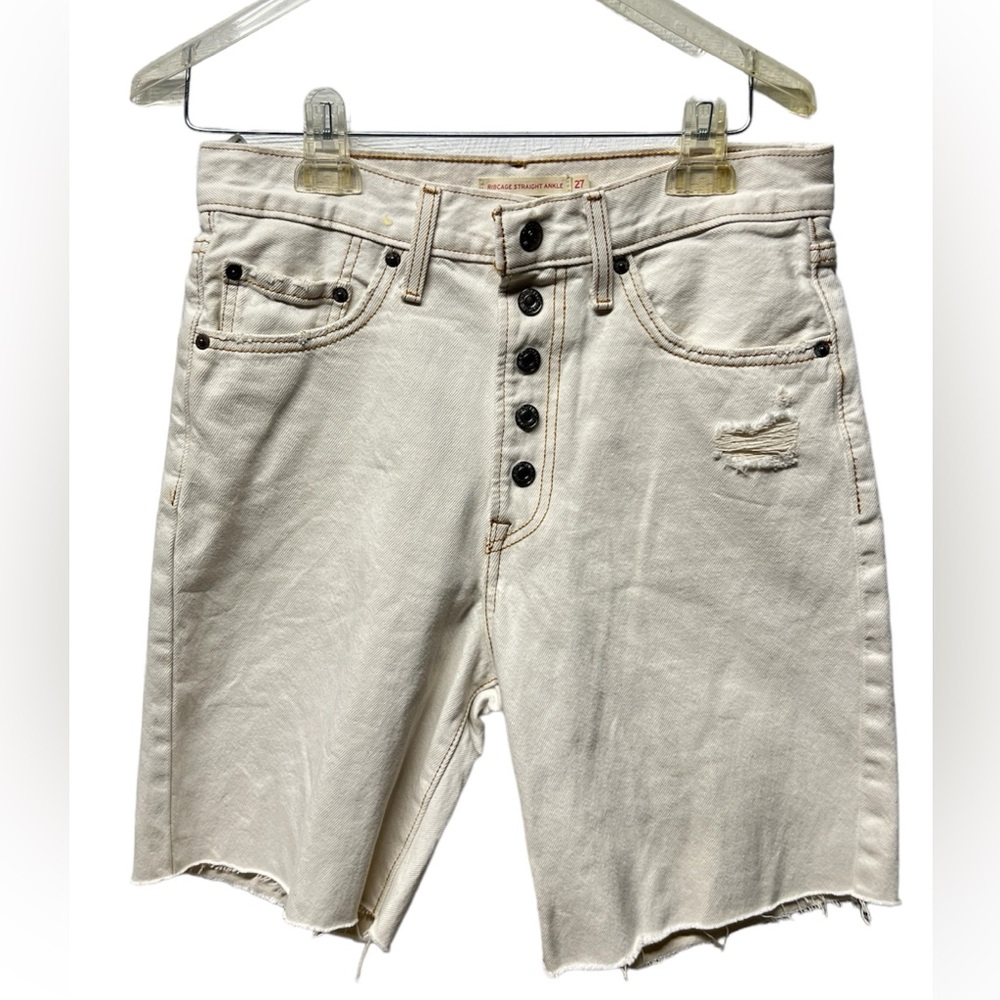 Levi’s ribcage off white cream button fly cutout raw hem Bermuda shorts size 27